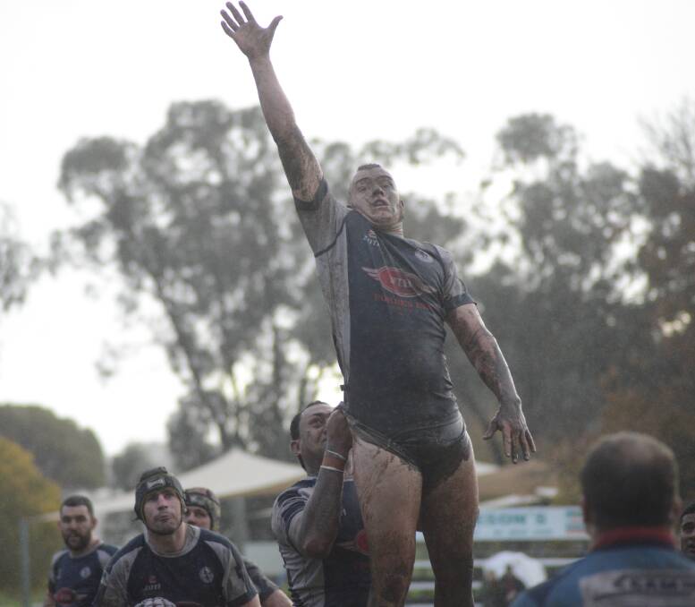 Adrian Cole reaches for the ball in the line-out against Dubbo Kangaroos a few weeks ago. The Forbes Platypi had another win on Saturday against the Narromine Gorillas, beating them 29-15 in round 11 of the Blowes Clothing Cup. 