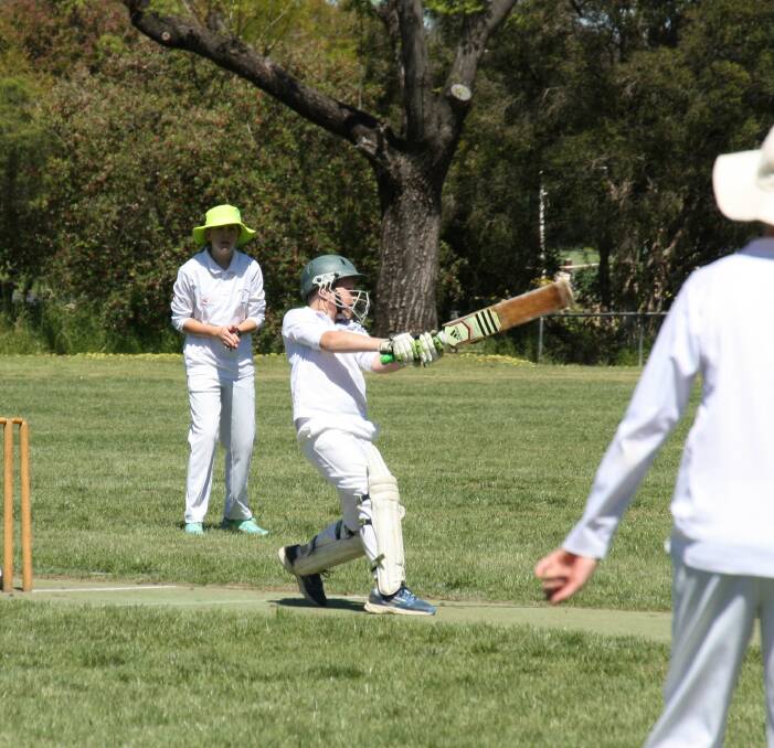 Joe Ellison hits out in the Under 12s game at the Botanical Gardens last Saturday.