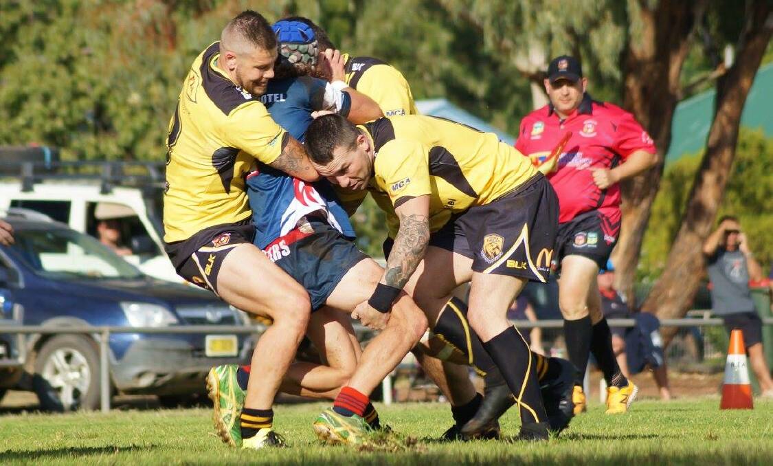 JJ Wykamp makes a tackle for Eugowra Eagles. Photo contributed.