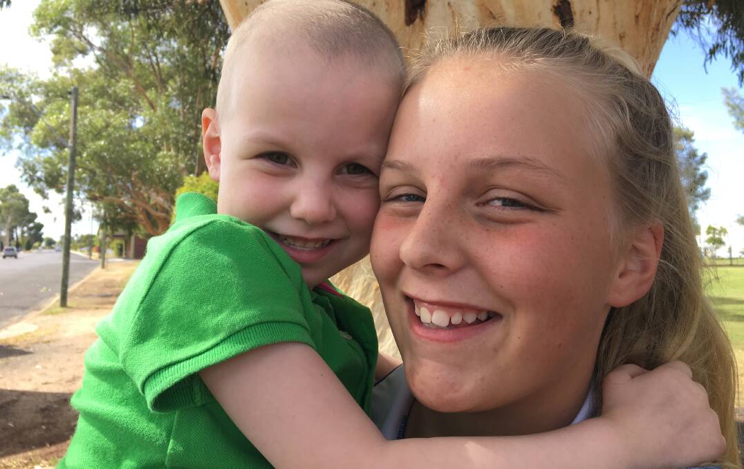 Ava and Scarlett Garland before Scarlett had her head shaved during the World's Greatest Shave. Scarlett was one of the top 10 fundraisers in NSW.