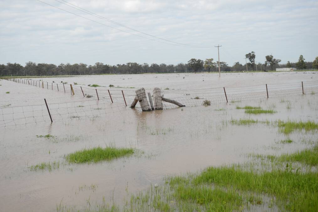 Water on Landrace Road during last week's flood peak. The BOM has issued a fresh flood watch for inland river systems with continued rainfall. 