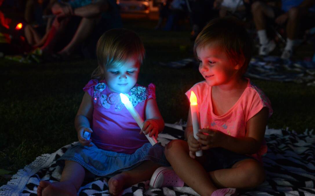 Maya and Eila Duggan at Carols by Candlelight in Victoria Park in 2015.