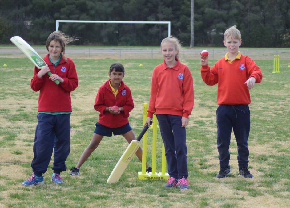 Getting set for cricket season ... Forbes North students Kitana Green, Olly Flick, Grace Godden and Konnor Coleman at Cricket NSW gala day in Forbes last month.