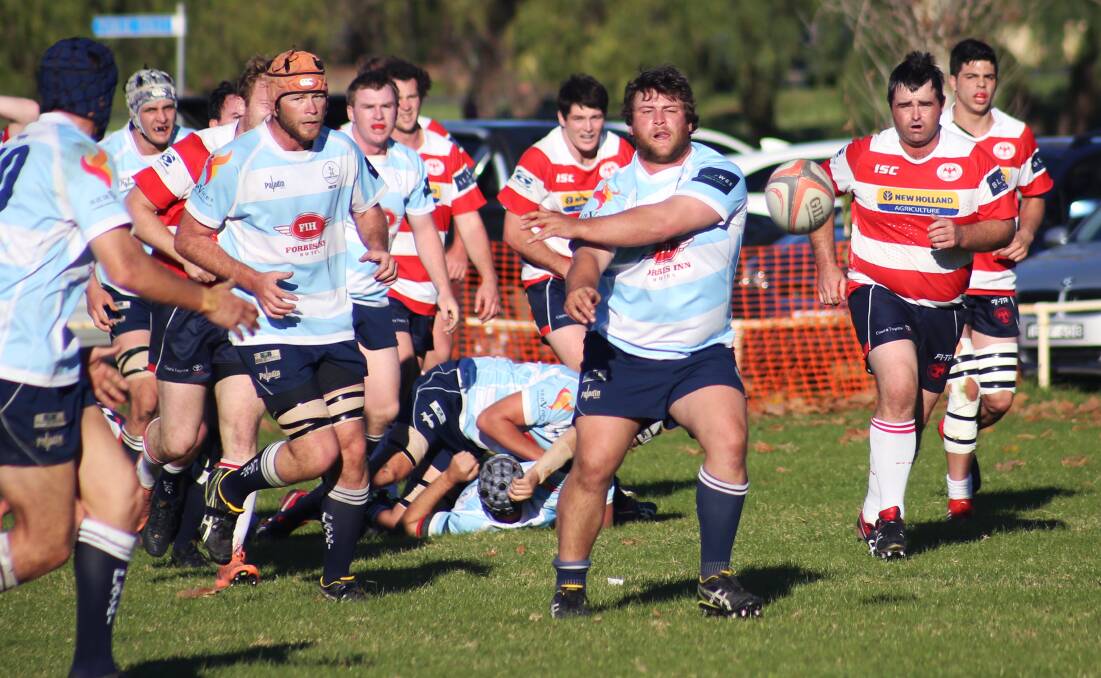 Jarrod Hall fires off a pass in Saturday's game against the Cowra Eagles. 