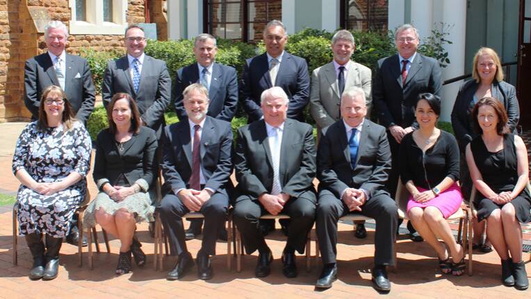 Mayor Graeme Miller (seated centre) and deputy Grant Clifton (on his right) with councillors and senior staff.