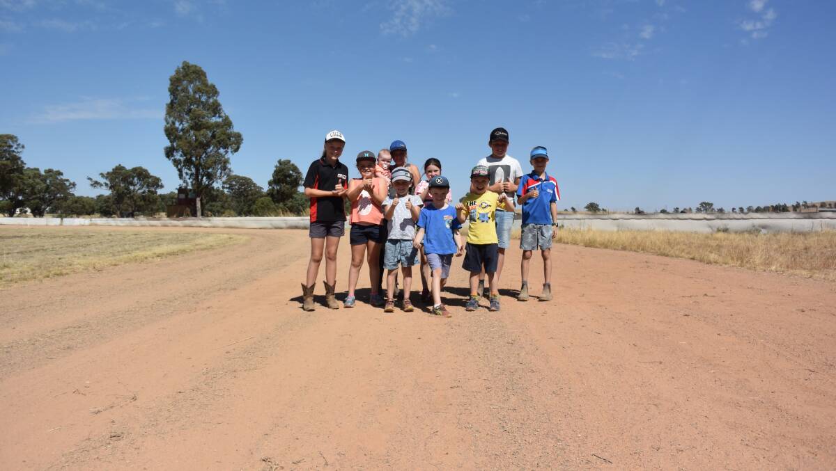 Kirby Maslin, Georgia Drane, Hannah Hope-Hodgetts, Grace Fraser, Holly Hope-Hodgetts, Joe Ellison, Tom Drane (front) Sam Drane, Hugh Hope-Hodgetts and Jackson Beaudin checking out the track - they're keen to get racing on their home ground again.