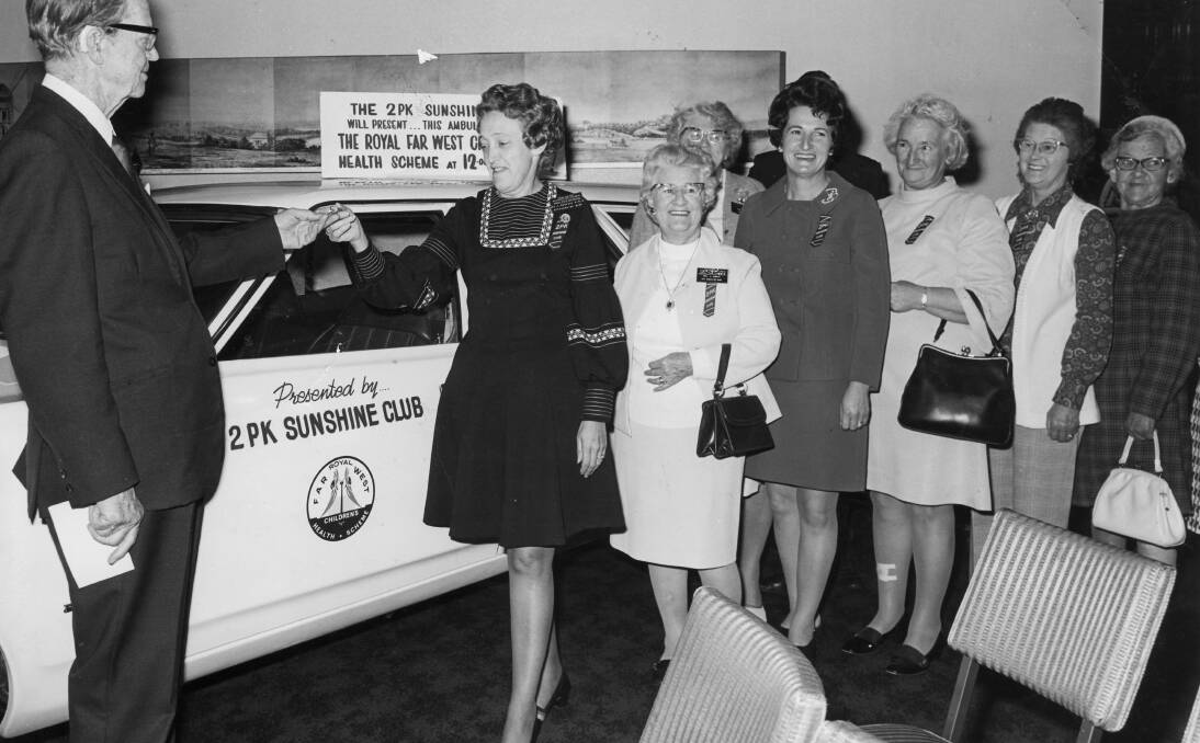 Betty and the Sunshine Club handing over a station wagon, source unknown.