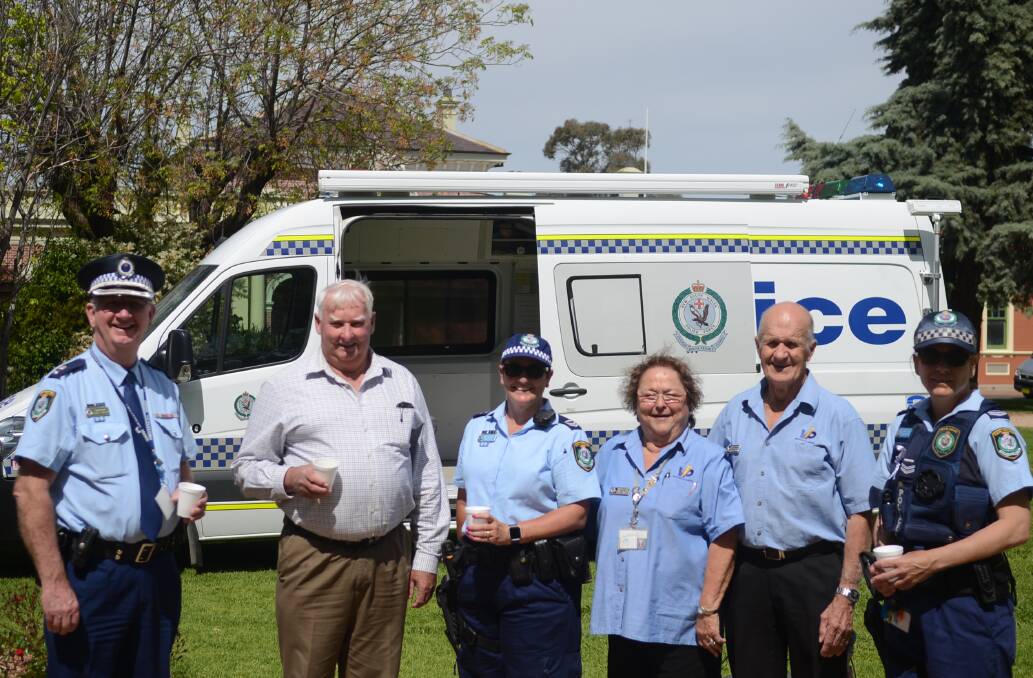 Mayor Graeme Miller at the Cuppa with a Copper event with Supt Chris Taylor, Senior Constable Mel Maguire, Sandra and Ron Hocking and Sen Con Sandra Barton in Victoria Park on Wednesday morning.