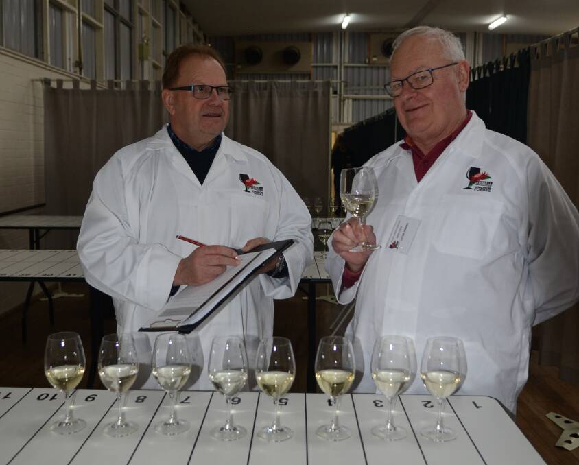 The show's first chief judge David Morris has returned for the 25th annual show, along with fellow former chief judge Lester Jesberg from Winewires. The pair is tasting a class of semi-sweet white wines. 
