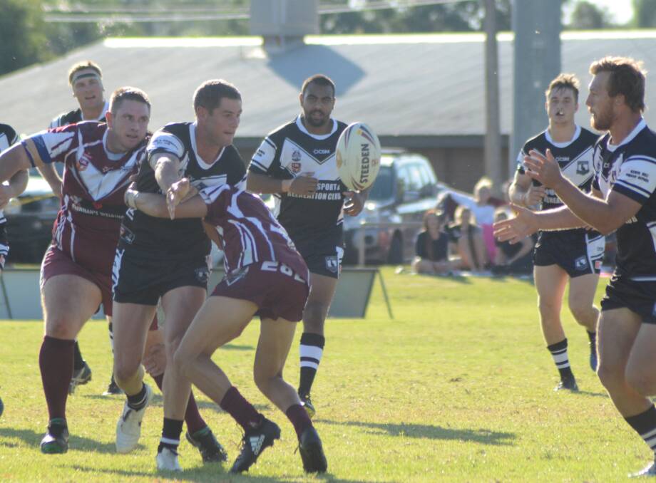 Jake Grace gets the ball away in last weekend's clash with Wellington Cowboys.