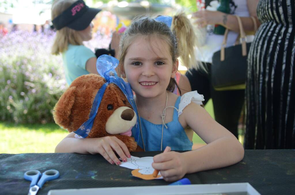Savannah-Rose Cross with her teddy bear at the 2016 teddy bear's picnic.