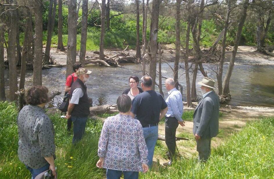 DETERMINED: Concerned environmentalists at a meeting near Cliefden Caves, near the Belubula River. Photo: Supplied