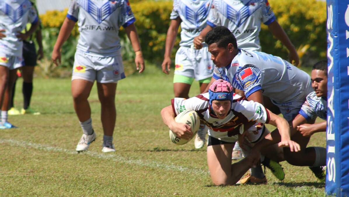 OVER HE GOES: Matt Burton scored a try for NSW Country in their clash with Samoan side Savaii on Monday. Photo: CRL