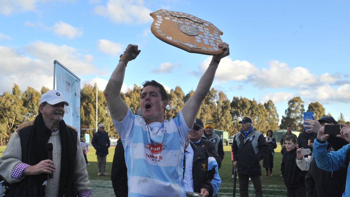 OH, YEAH: Forbes Platypi skipper Jack Hammond was sensational in his side's win over Orange Emus and was understandably thrilled to lift the premiership shield. Photo: JUDE KEOGH