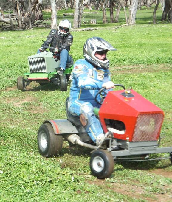 David Teele and Craig Burke racing lawn mowers. McClintock Kubota Forbes are the major sponsor of the new lawn mower racing entertainment at the Forbes Show.