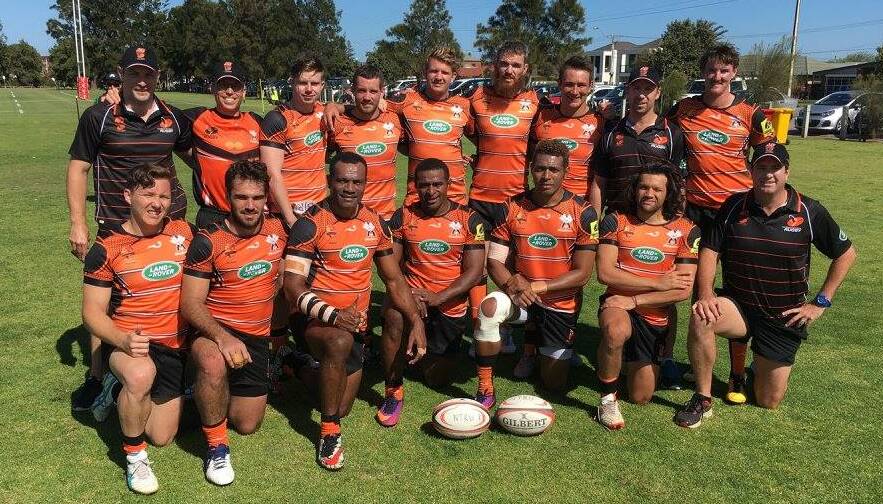 STINGERS: Ben Parkes (middle, back), with the Mozzies squad at last year's nationals. Photo: NT RUGBY