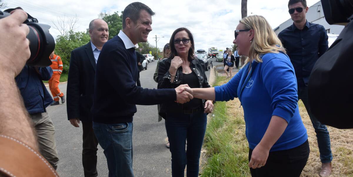 FLOOD VISIT: NSW Premier Mike Baird meets Forbes resident Pip Davies during his visit to flood affected areas last week. PHOTO: Olivia Grace-Curran