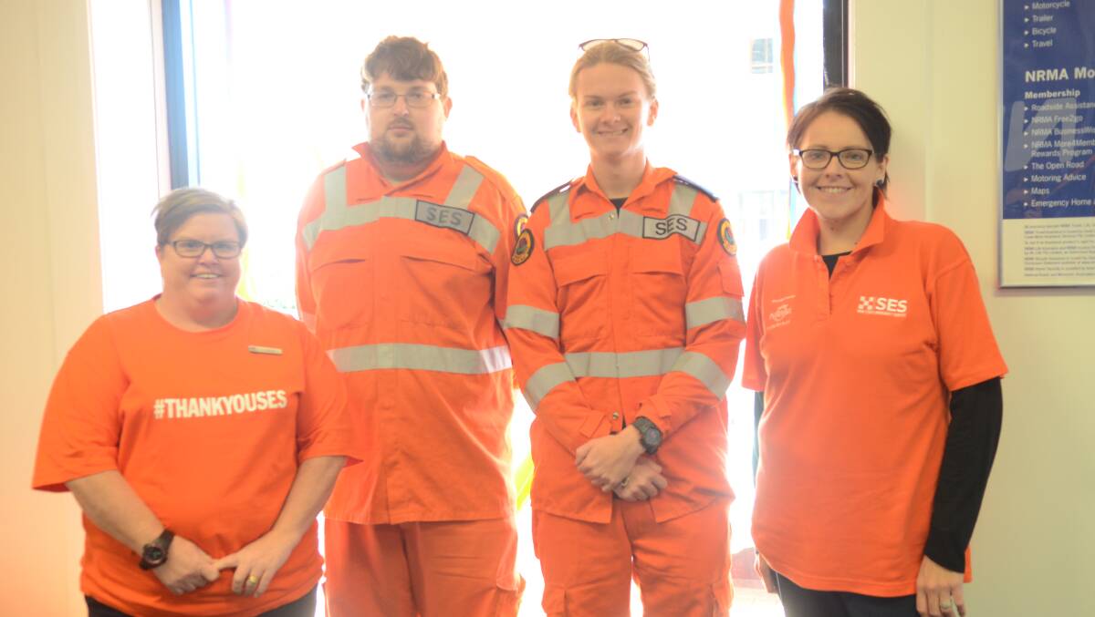 NRMA employees Louise Allen and Leah Smith with SES volunteers Josh Gavin and Rhys Steffan on Wear Orange Wednesday.