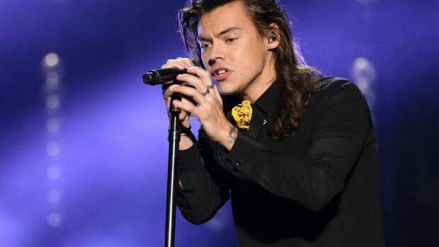 Harry Styles performs at the American Music Awards.  Photo: MATT SAYLES
