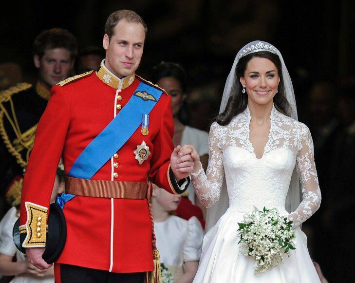 FILE - In this April 29, 2011, file photo, Britain's Prince William and his wife Kate, Duchess of Cambridge, stand outside of Westminster Abbey after their Royal Wedding in London. Tiaras, famously worn by British royals like the former Kate Middleton and Princess Diana, are there for those princess moments, and may soon be making a bridal comeback says Shane Clark, senior fashion and accessories editor at Brides magazine. (AP Photo/Martin Meissner, File)