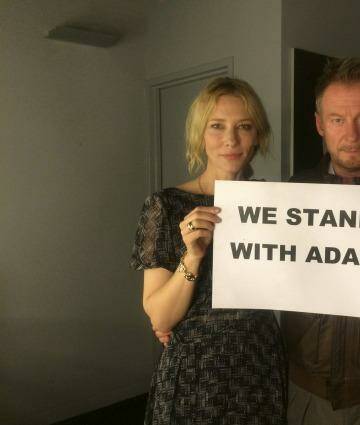 Cate Blanchett and Richard Roxburgh offering support for Indigenous AFL player Adam Goodes. Photo: STC
