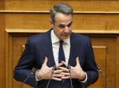 The government of PM Kyriakos Mitsotakis was accused of "trying to hide the truth" about the crash. (AP PHOTO)