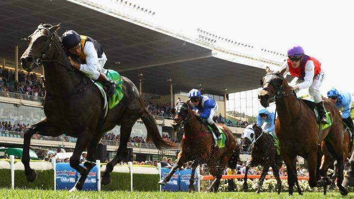 Stellar performance: Damien Oliver stokes Galaxy Pegasus (left) to victory at Moonee Valley on Saturday. Photo: Quinn Rooney/Getty Images
