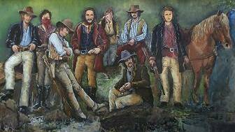 BACKS TO THE WALL: An artists depiction of Frank Gardiner and Ben Hall's gang, which is a wall mural at Eugowra.