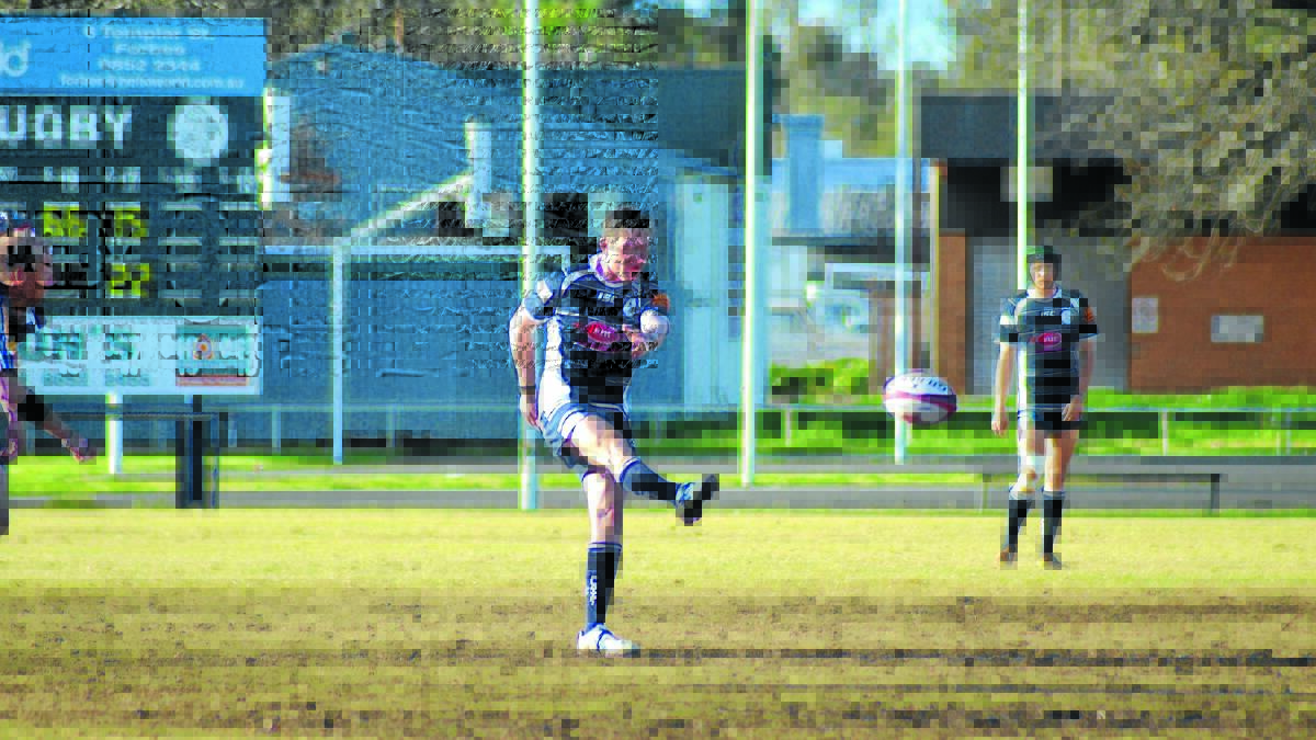 Jack Hammond makes a kick during last weekend’s match against the Cowra Eagles. The Platypi will be hoping for a win against Mudgee today to keep semi-finals hopes alive. 0615platypi20(1)