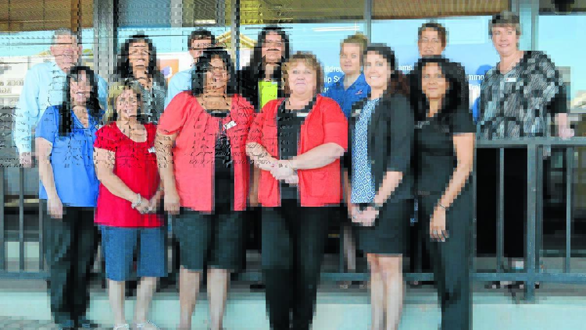The new housing team at CentaCare for Forbes, Parkes, Bourke and Cobar include (back) housing manager Brian Asimus, Penny Carlisle, Blake Nicholson, Rebecca Palenapa-Pili, Jaymaree Milgate, Maree Grant, Dallas Haynes, (front) Alanna Josephson, Karly Potter, Lizzie Orcher, Cathie Schatz, Stefanie Cheney and Christine L’Estrange. Absent is Bourke team leader Keiran Barber. 1014homelessteam(1)