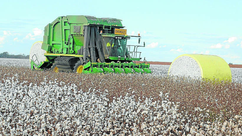 This picture of a John Deere round baler picking cotton could start to become a more regular sight in Forbes after an information meeting was held recently. Photo: The Land
