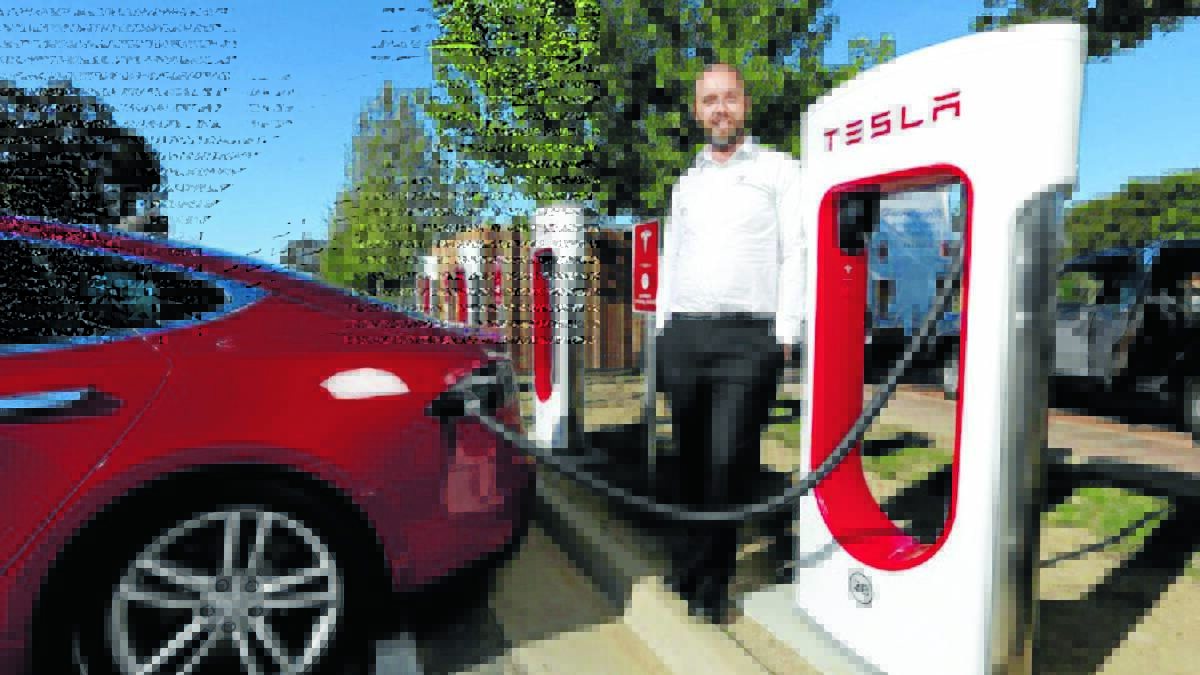 The Tesla supercharger station in Goulburn, where electric car drivers can plug in.