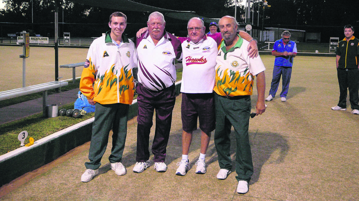 Forbes’ Jarrod Andrews, Mick Stewart (Harbord), Dave Shearer (Harbord) and Forbes’ Russell Dietrich after the grand final of the pairs in the Easter Bowls Carnival. 