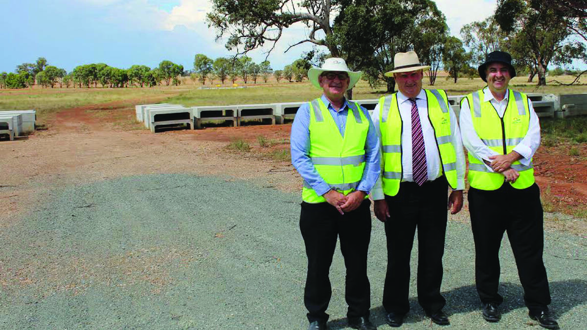 Forbes Shire Council general manager Brian Steffen, deputy mayor Graeme Miller and director of engineering and technical services Ray Graham at the intersection of Bogan Gate and Lima roads where bypass work is starting.  