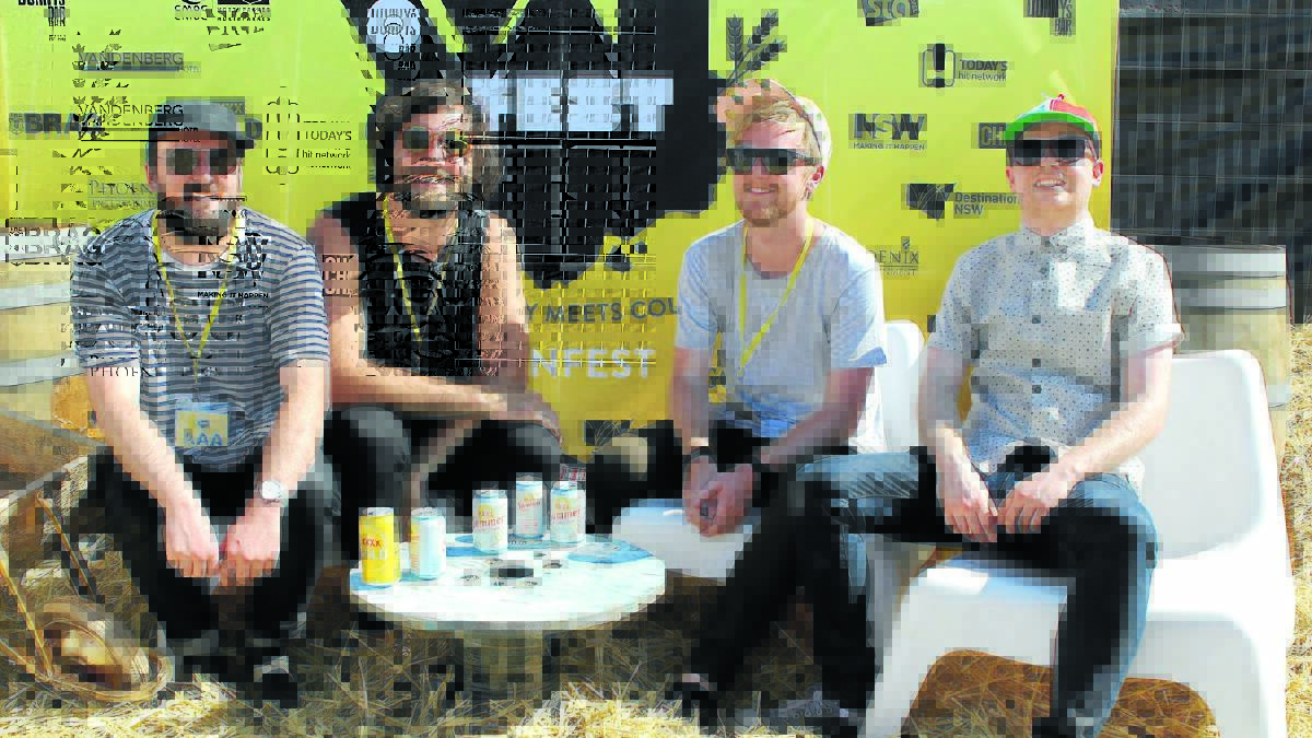 Matt Boylan-Smith (second from left) with his band members Max Simmons, Sam Reid and Chris Sheley. 1215vanfestsats(1)