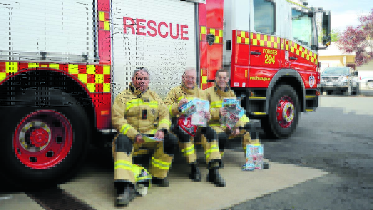 Lego City and real life fire heroes … Everyone is invited to Saturday’s open day at Forbes Fire Station, with local firies Andrew Rousell, Brian Clarke and Mat Teale. 0516fireopenday