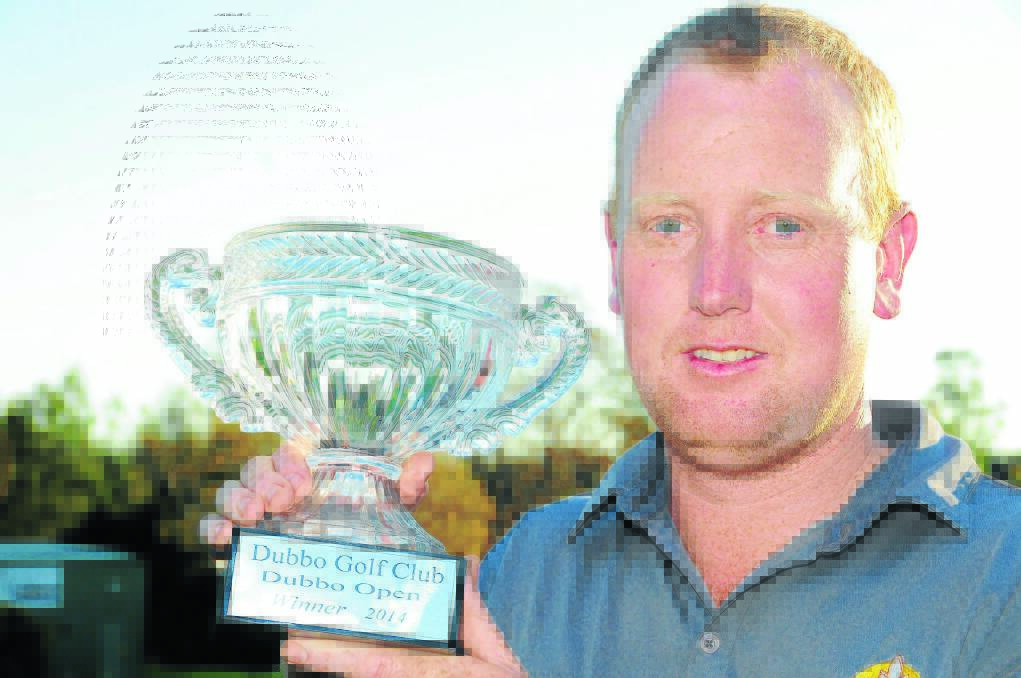 Forbes’ John Betland with his Dubbo Open trophy. Photo Daily Liberal
