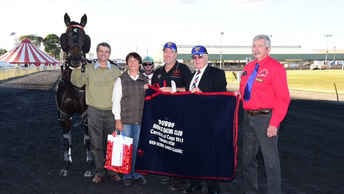 Freedom Is with owners Phillip and Denise Thurston, Red Ochre organiser Brett Wrigley, Chris Edwards (Harness Racing NSW) and Len Edwards (Dubbo Harness Racing Club president) after Sunday’s Red Ochre Mares Classic at Dubbo Paceway. Photo: BELINDA SOOLE, Daily Liberal