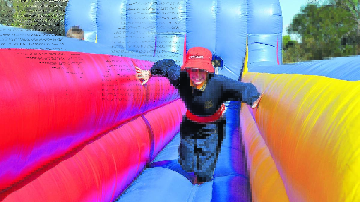 Will Wallace on the ‘running bungee’ at last year’s super mega fun day .