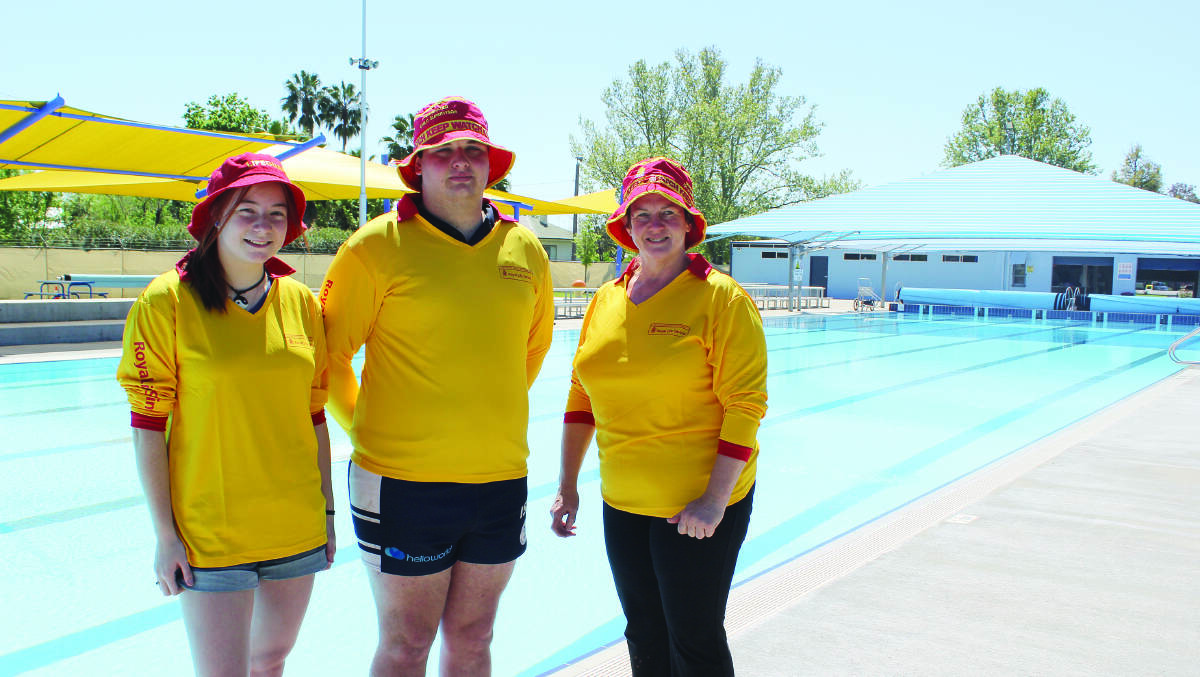 Pool manager Maree Reiher (right) with new lifeguards Tannaya Stokes-Hicks and Hamish McIntosh. 1015poolopens(1)