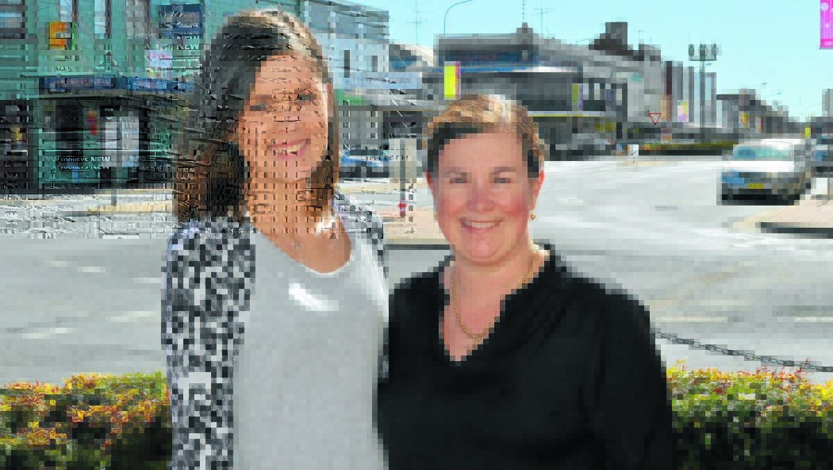 Katrina Ferguson (right) is the new marketing and events coordinator with Forbes Business Chamber, taking over from Sarah Davies (left). 0814handover(2)