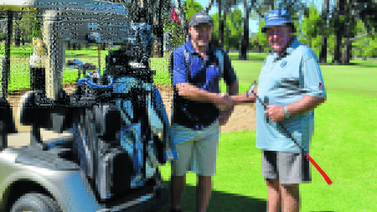  Pennants 2 player Dave Mylecharane congratulates Jim McLuckie on a great game of 
pennants golf. 0216golfpennants
