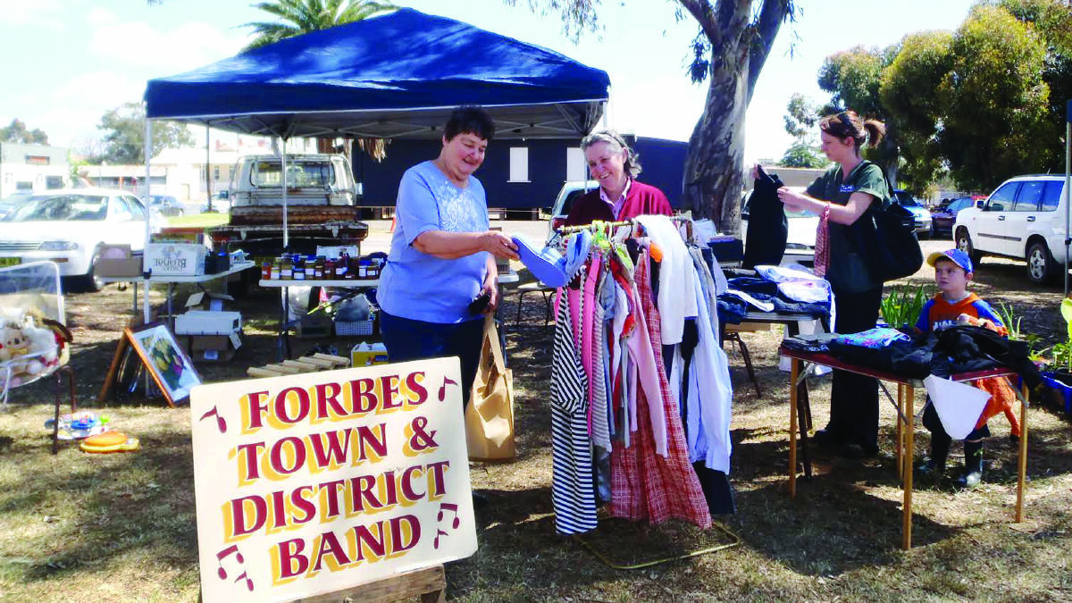 Robyn Kenny selling up a storm raising funds for Forbes Town Band.