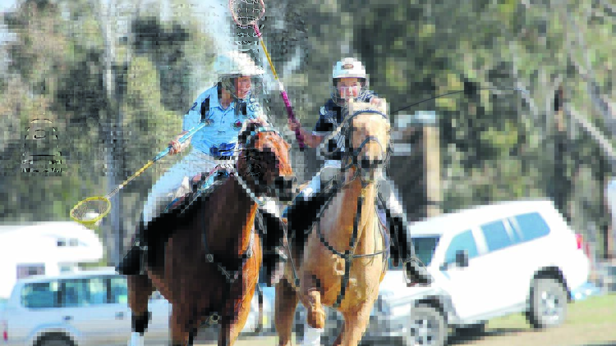 Colly Thomas and his mare Kit (left) playing for the winning NSW under 12s team in Albury this week. Photo by Marlow Meares.