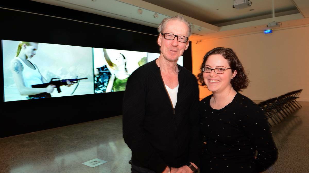 BATHURST: Bathurst Regional Art Gallery’s Richard Perram and Emma Hill are set to enjoy a three-screen epic by the world-renowned Russian arts collective AES+F. Photo PHILL MURRAY 041714part
