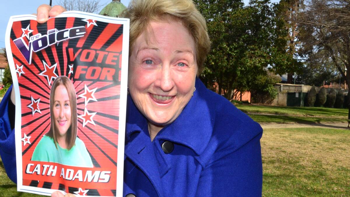 COME ON CATH: Singing sensation Cath Adams has made her mother, Sharon, so proud that she has created posters to garner support for her in The Voice. Photo: BRIAN WOOD	 073015vote1