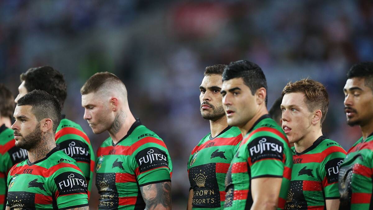 Greg Inglis of the Rabbitohs and team mates look defected after conceding a try during the round seven NRL match between the South Sydney Rabbitohs and the Canterbury-Bankstown Bulldogs at ANZ Stadium on April 18, 2014 in Sydney, Australia. Photo: Mark Metcalfe/Getty Images.