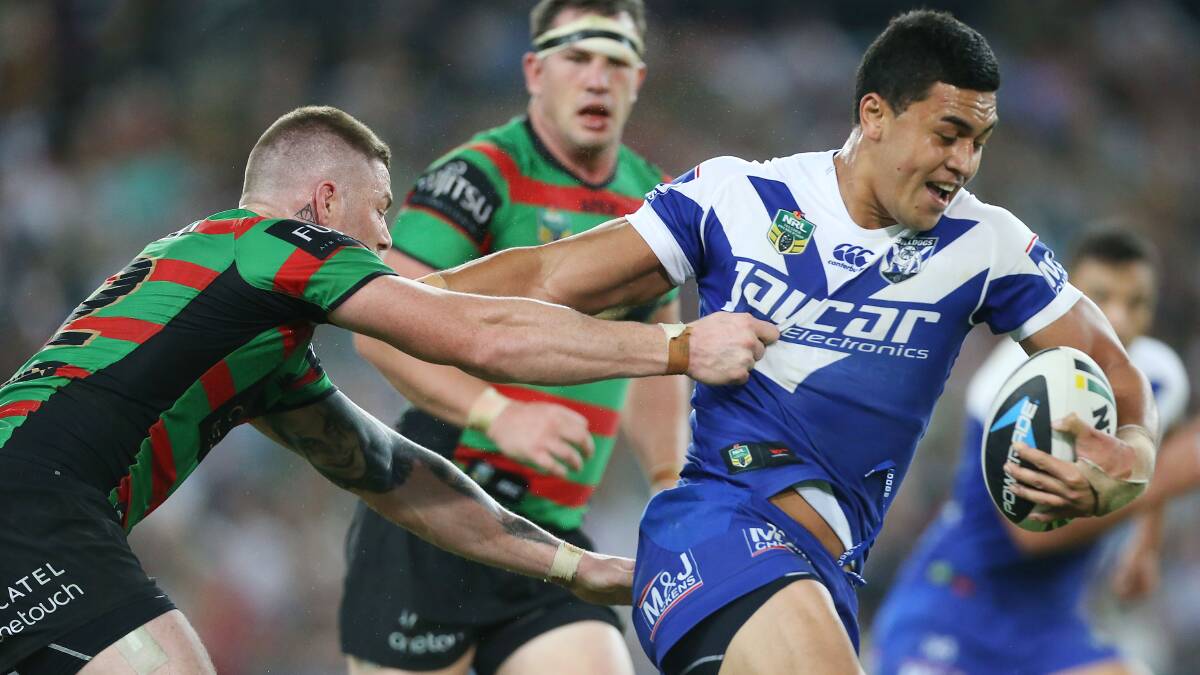 Tim Lafai of the Bulldogs is tackled during the round seven NRL match between the South Sydney Rabbitohs and the Canterbury-Bankstown Bulldogs at ANZ Stadium on April 18, 2014 in Sydney, Australia. Photo: Mark Metcalfe/Getty Images.