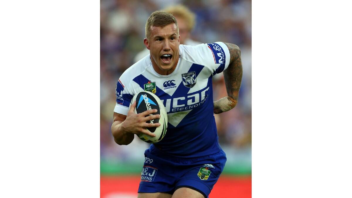 Trent Hodkinson of the Bulldogs calls a play during the round seven NRL match between the South Sydney Rabbitohs and the Canterbury-Bankstown Bulldogs at ANZ Stadium on April 18, 2014 in Sydney, Australia. Photo: Renee McKay/Getty Images