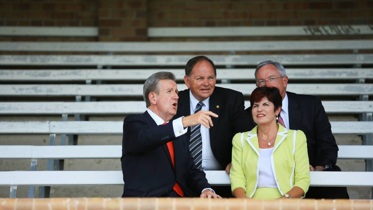 Premier Barry O'Farrell sitting in the grand stand at Maitland No1 Sportsground with Robyn Parker , Peter Blackmore and Brad Hazzard after announcing funding for the facility. Picture: Peter Stoop